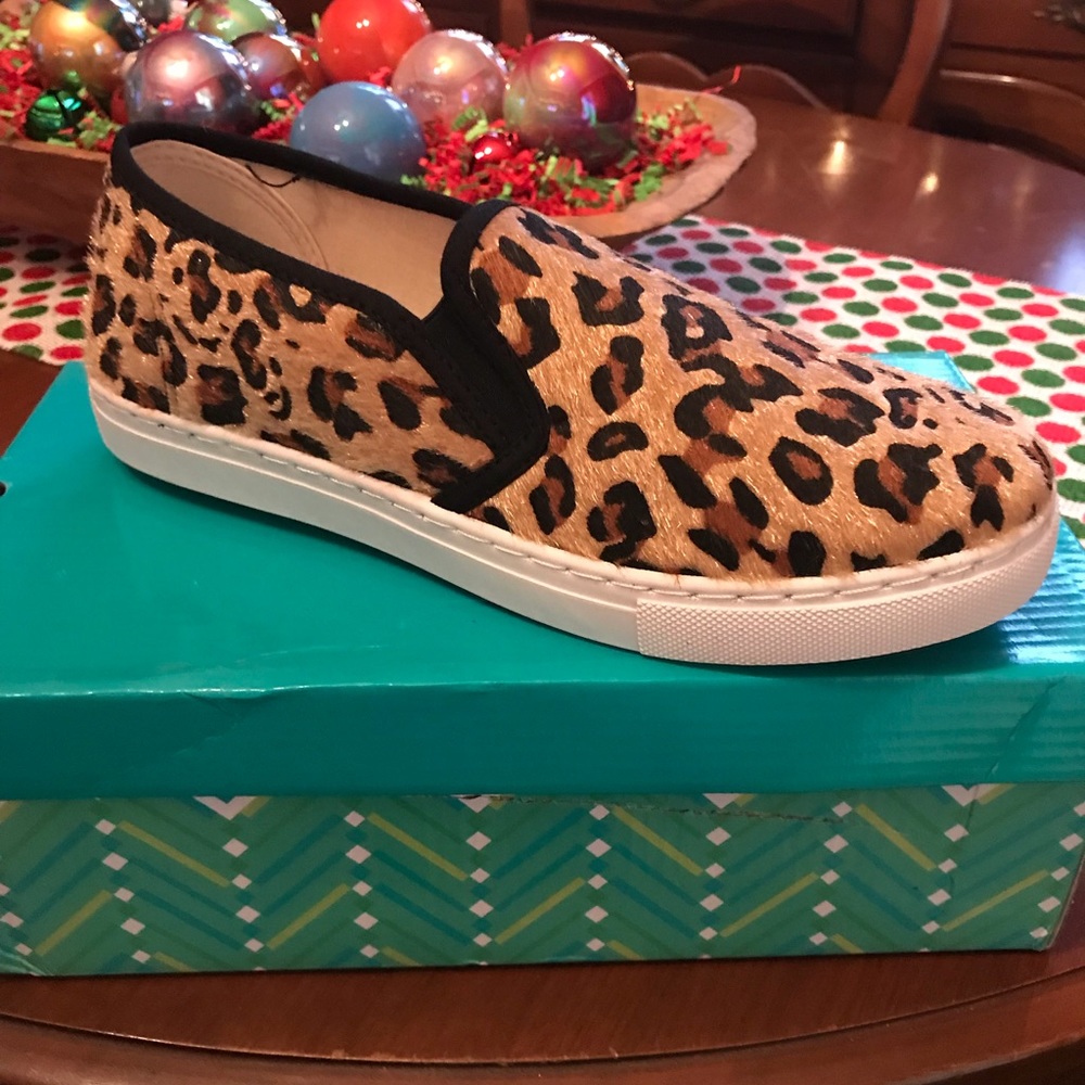 Leopard print pony hair sneakers.